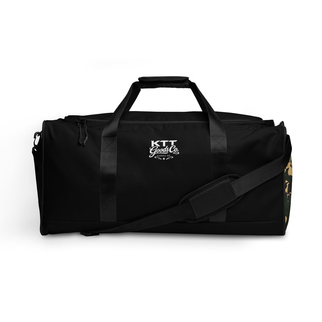 Front view of the TV-D1 Field Duffle Bag with one white KTT Goods Co. mark centered between the black carry straps.