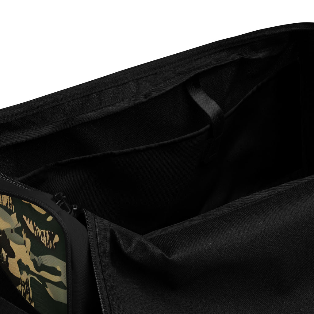 Inside view of the TV-D1 Field Duffle Bag showing the black lining and interior pocket.