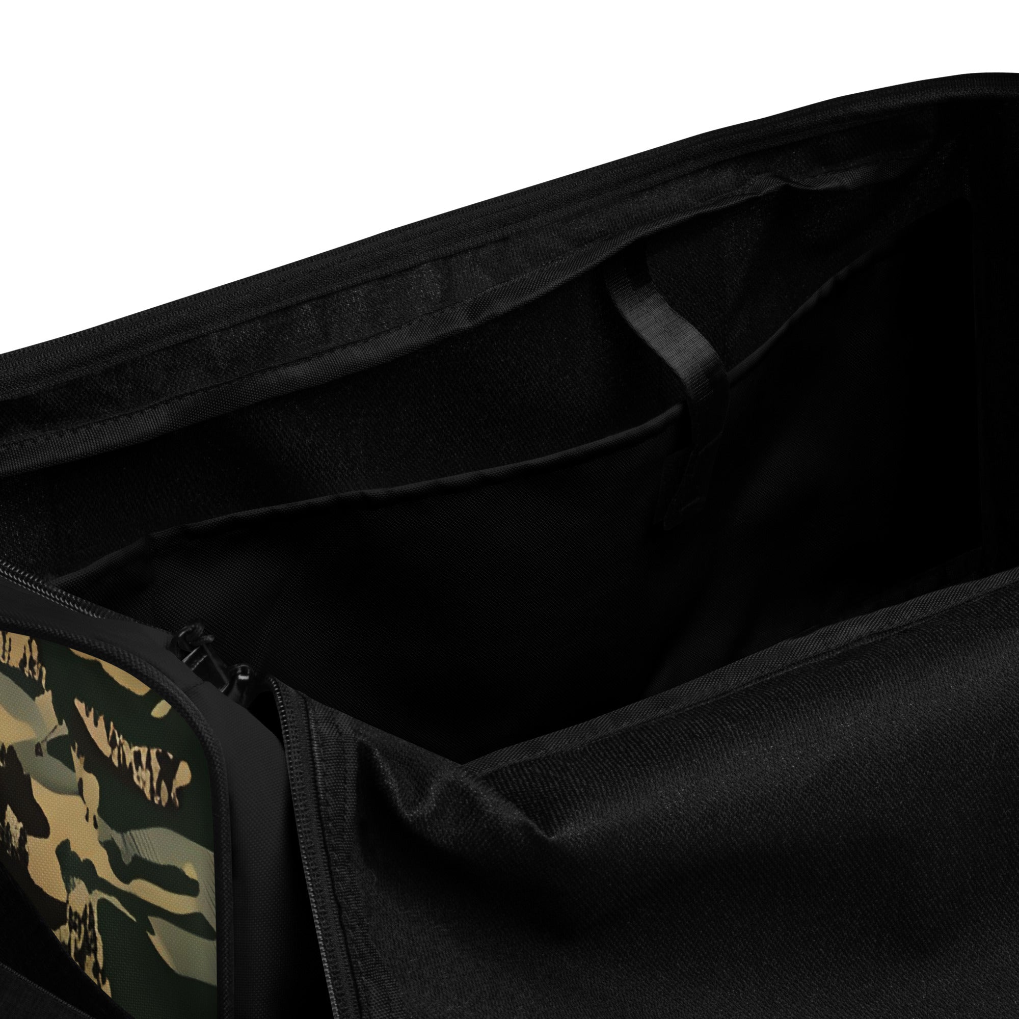 Inside view of the TV-D1 Field Duffle Bag showing the black lining and interior pocket.